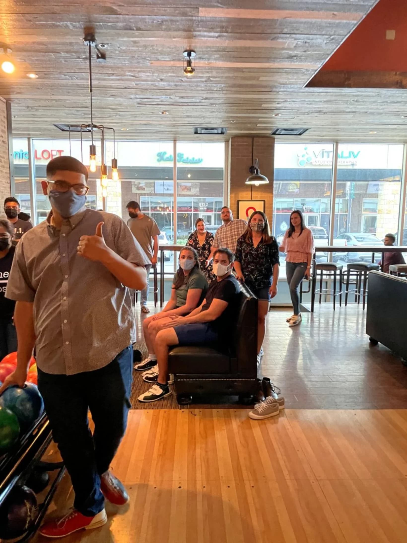 ITECS team enjoying bowling night team building event