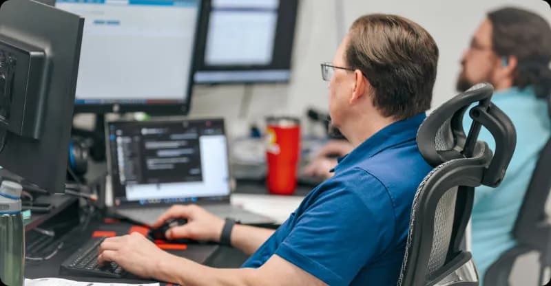 ITECS Security Operations Center team members monitoring Dallas networks