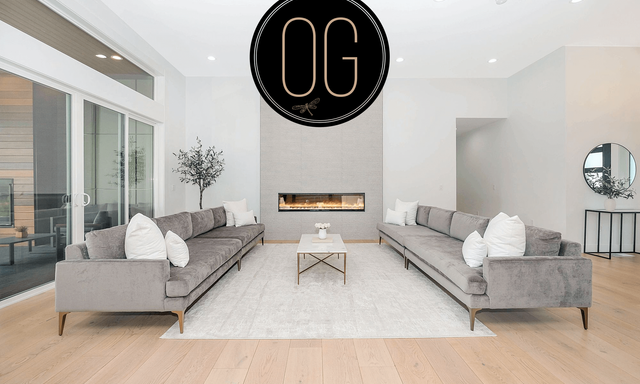 OG Interiors home-staging display with the company logo