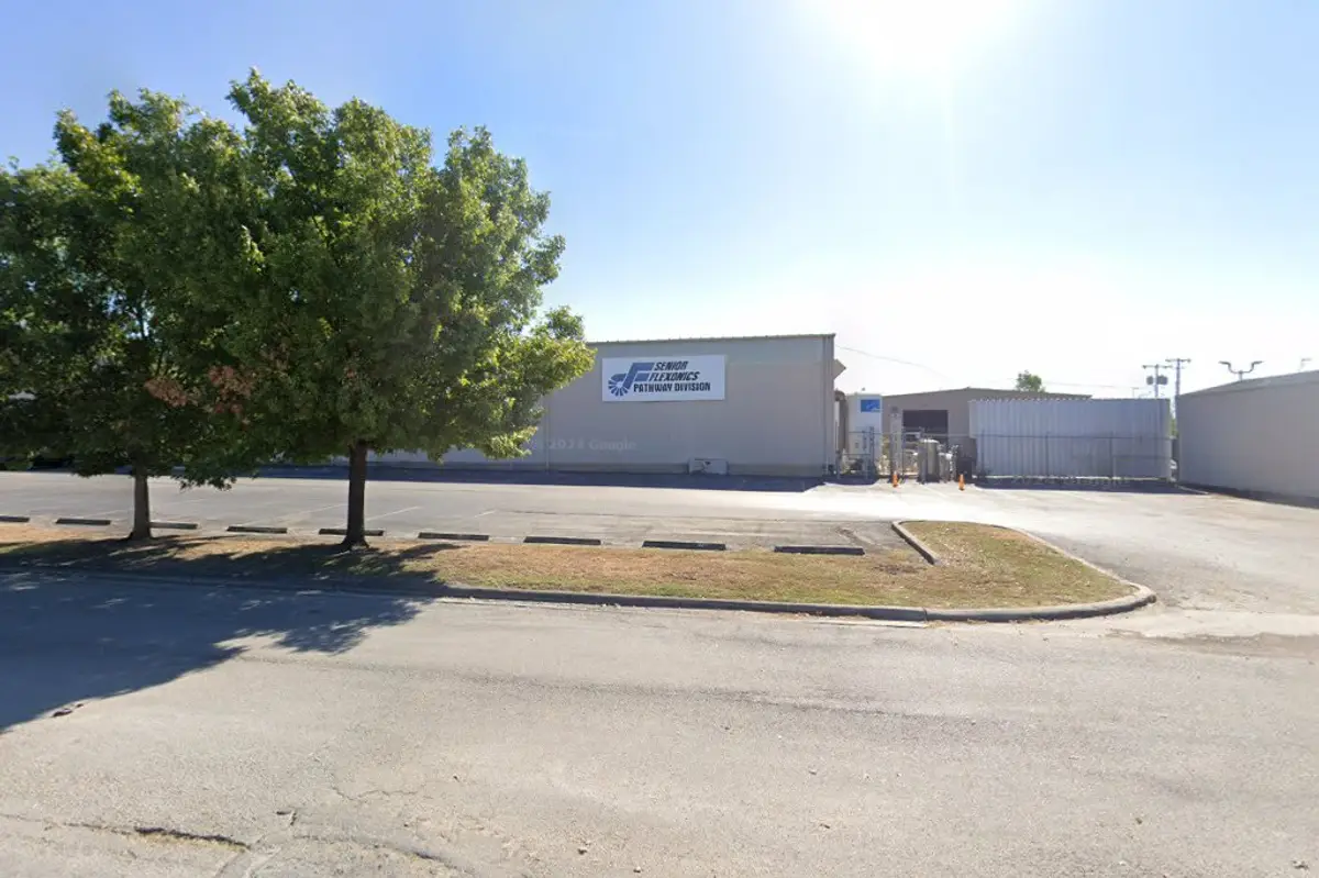 Senior Flexonics Pathway manufacturing facility in New Braunfels Texas showing the exterior of the defense manufacturing company that achieved CMMC Level 2 compliance with ITECS