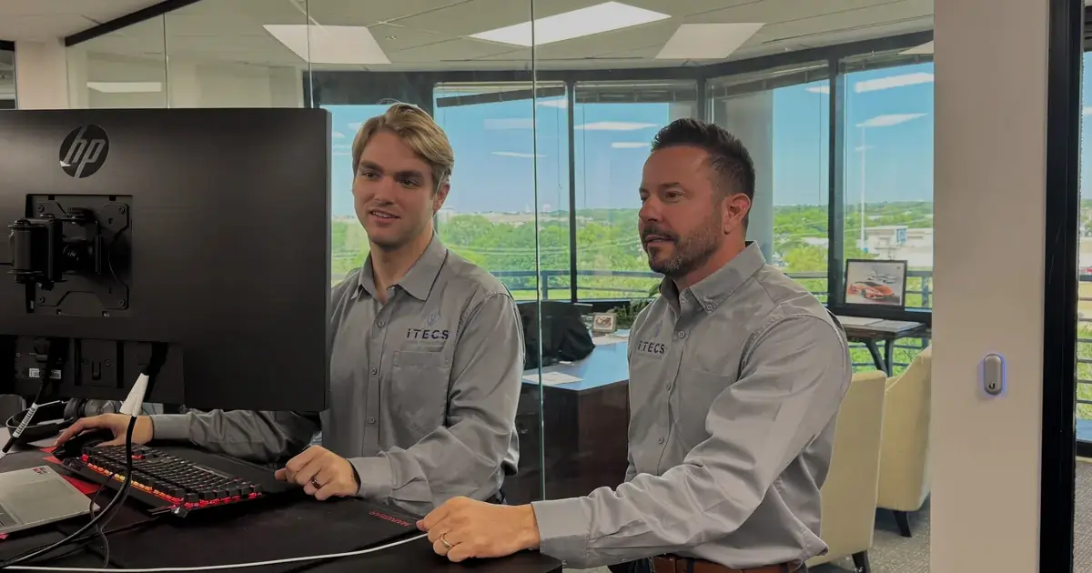 ITECS financial services IT support team members collaborating in Dallas office
