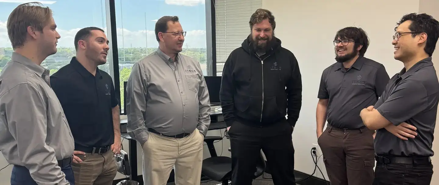 ITECS managed IT services team at their Plano, Texas office